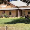 Old Wilcannia Hospital, with roos on the front lawn
